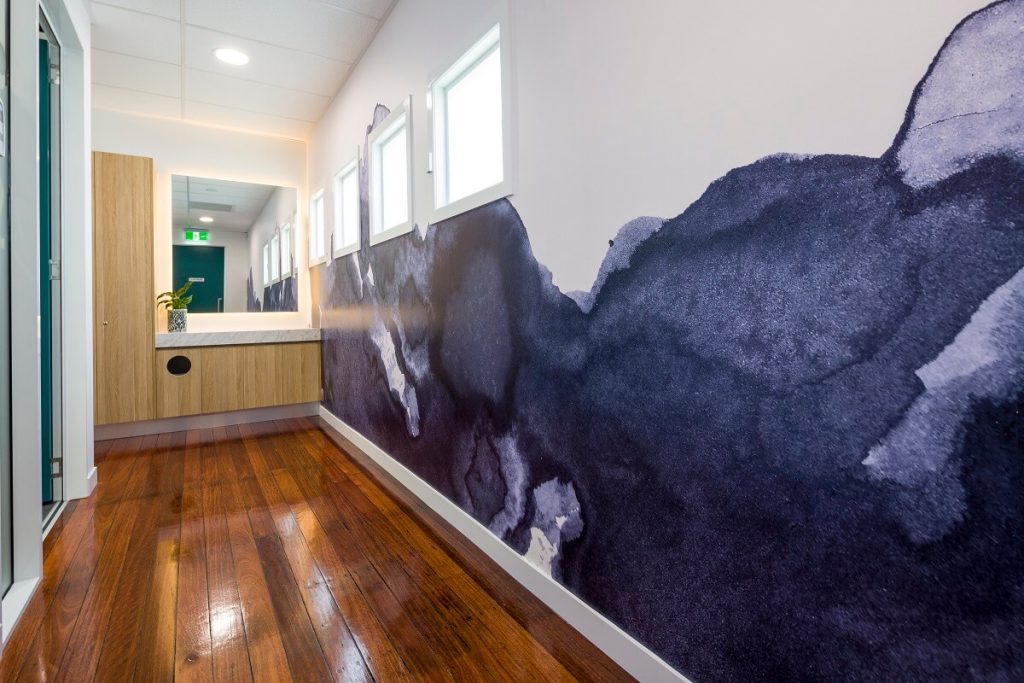 Wallpapered wall finish in this Brisbane dental healthcare practice fitout