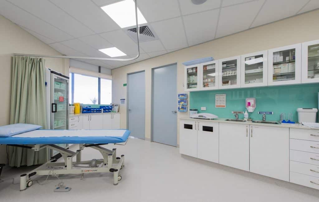 Medical practice treatment room with a variety of storage options